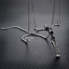 skeleton cross pendant